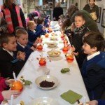 Children from St.Catherine's Primary visiting Church of Our Lady for the Christingle Service